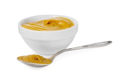 Photo of Fresh tasty mustard sauce in bowl and spoon isolated on white