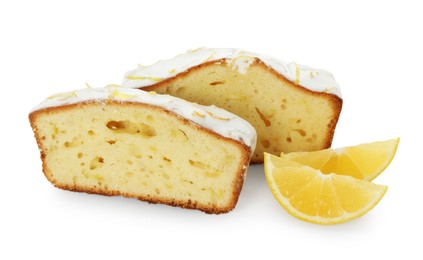 Photo of Pieces of tasty lemon cake with glaze and citrus wedges isolated on white