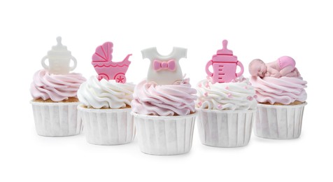 Beautifully decorated baby shower cupcakes for girl with cream and toppers on white background