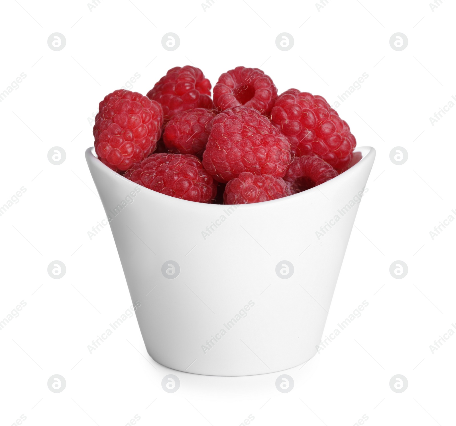 Photo of Fresh ripe raspberries in bowl isolated on white