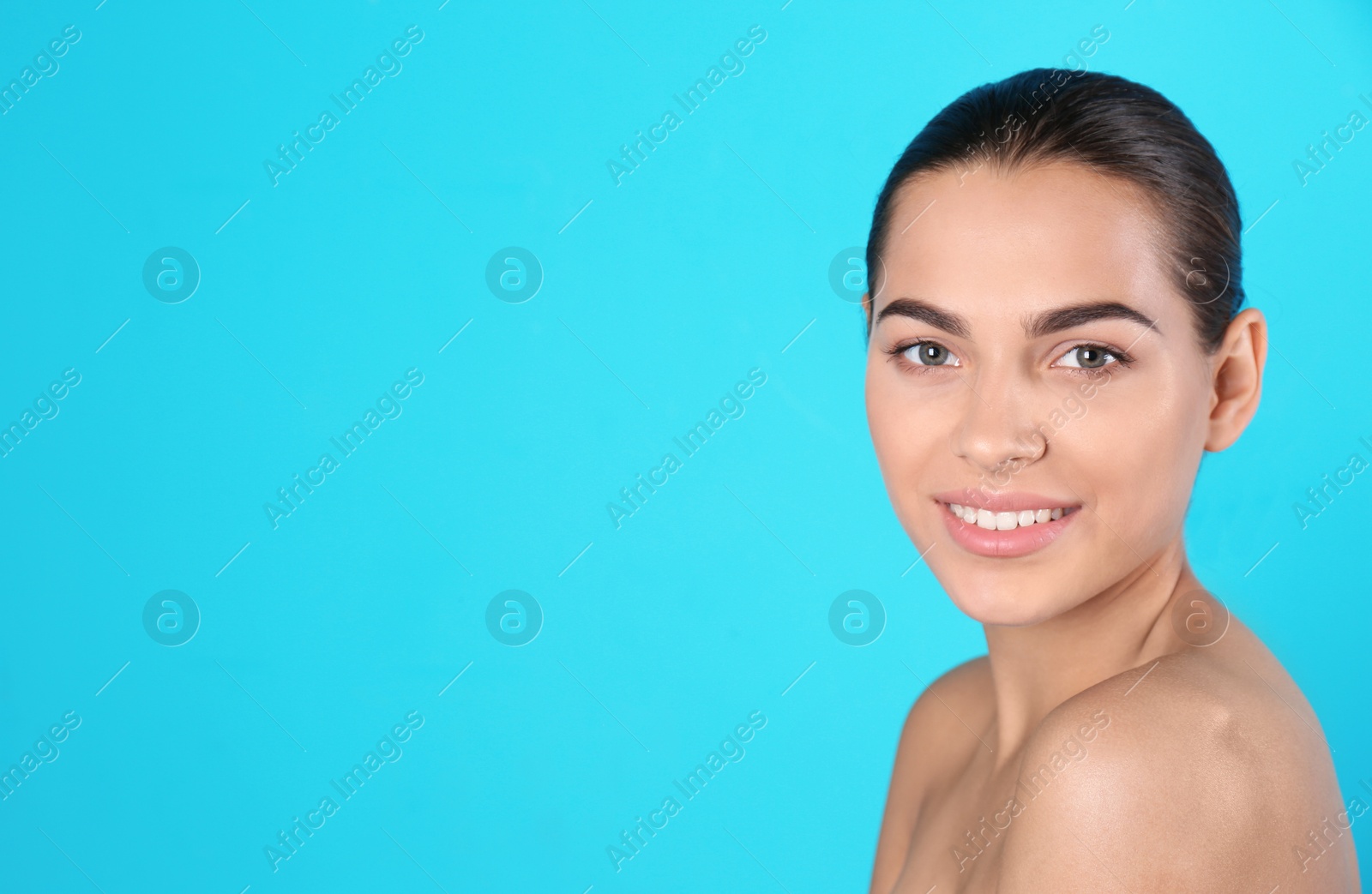 Photo of Portrait of beautiful young woman and space for text on color background. Cosmetic surgery concept