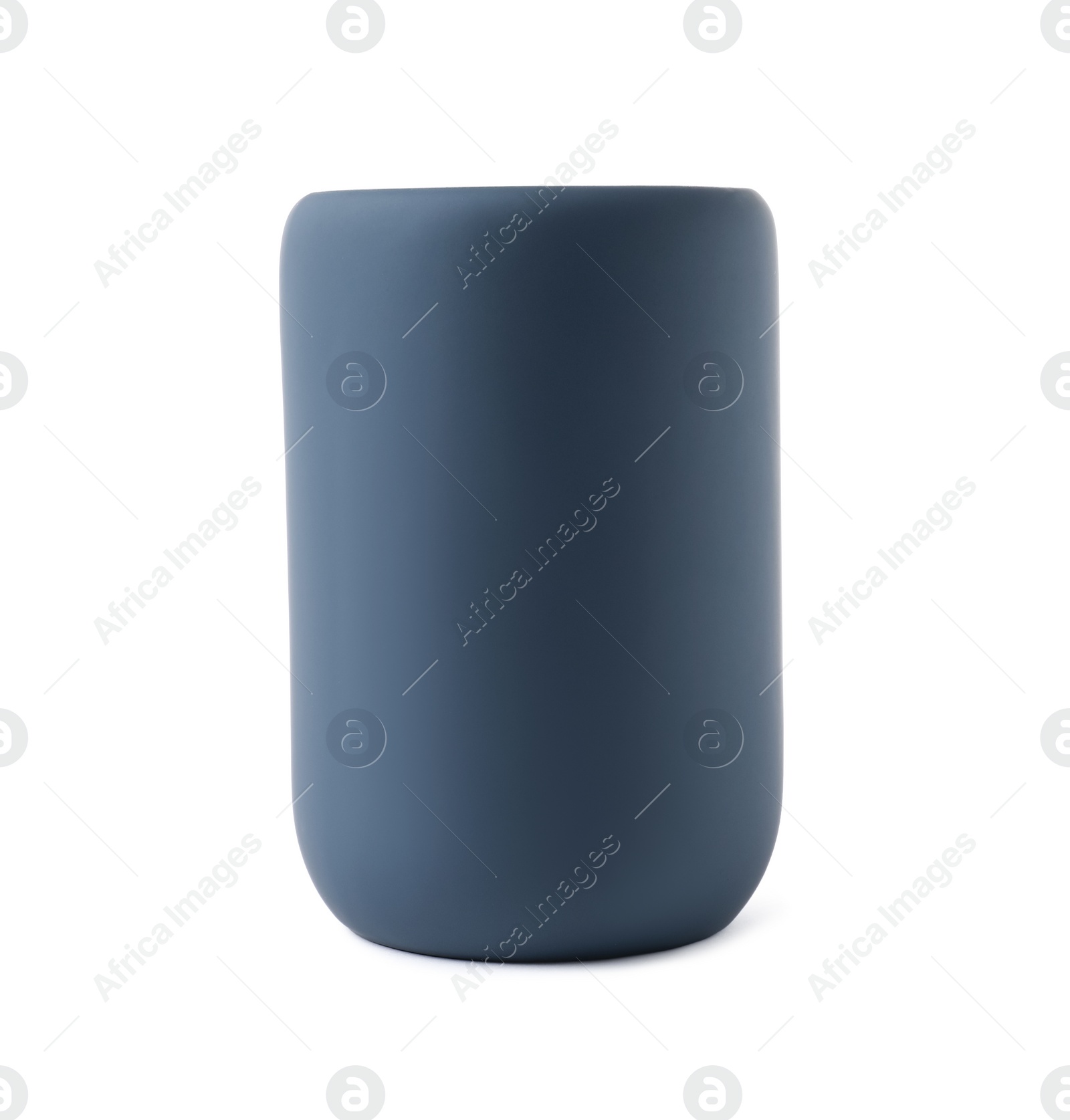 Photo of Bath accessory. Dark blue ceramic toothbrush holder isolated on white