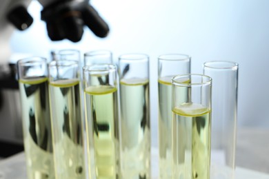 Photo of Test tubes with urine samples for analysis in laboratory, closeup