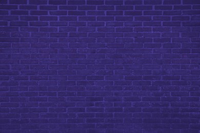 Image of Texture of indigo color brick wall as background