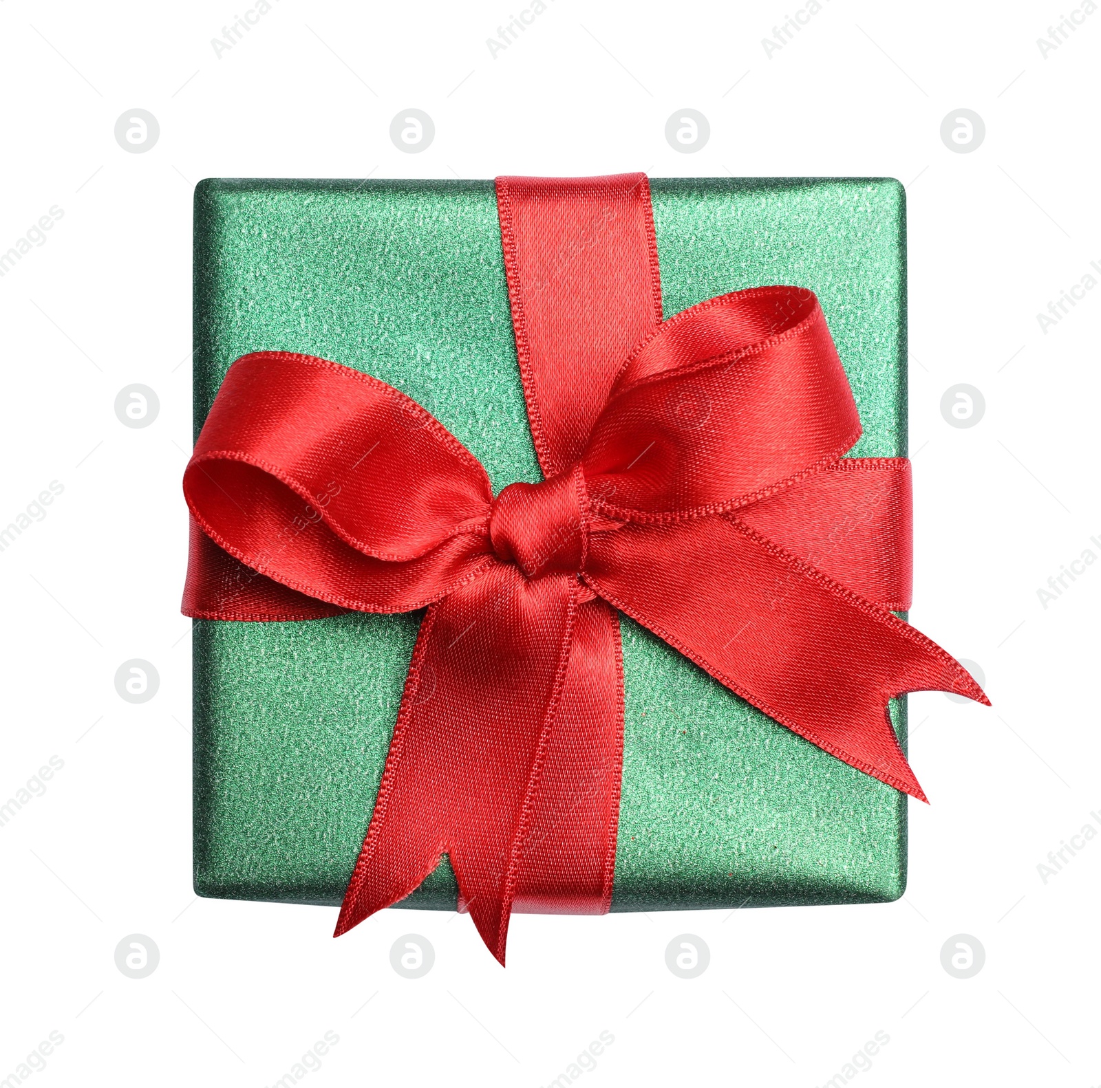 Photo of Christmas gift in box with red ribbon isolated on white, top view