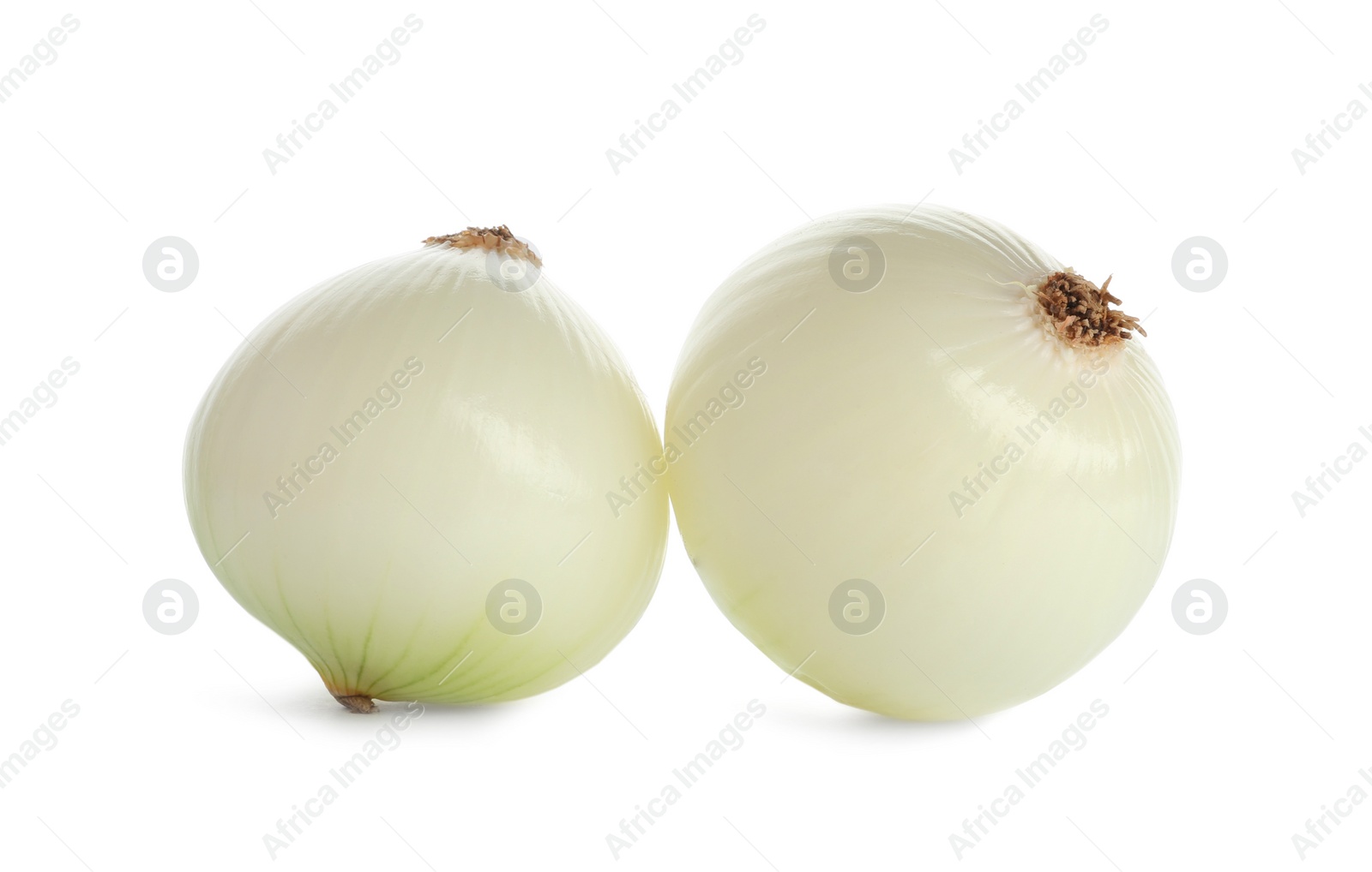 Photo of Fresh peeled onion bulbs on white background