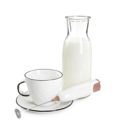 Mini mixer (milk frother), cup and bottle isolated on white