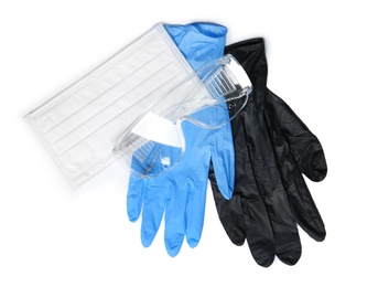 Flat lay composition with medical gloves and safety items on white background