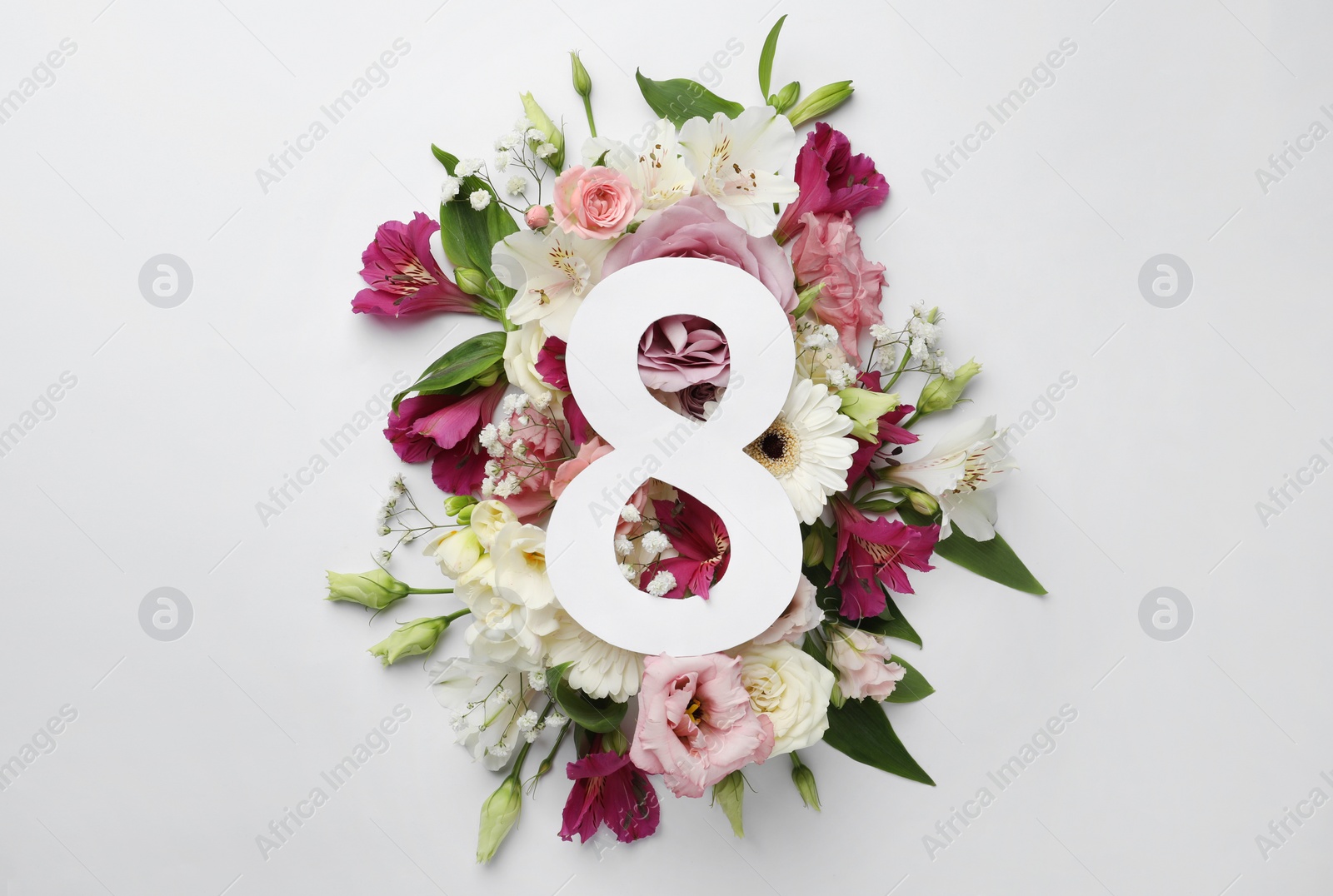 Photo of 8 March greeting card design with beautiful flowers on white background, flat lay. International Women's day