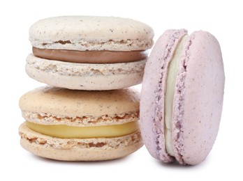 Photo of Different delicious colorful macarons on white background