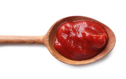 Tasty ketchup in wooden spoon isolated on white, top view