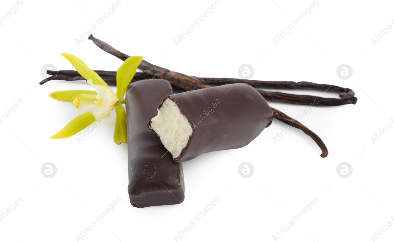 Photo of Glazed curd cheese bars, vanilla pods and flower isolated on white