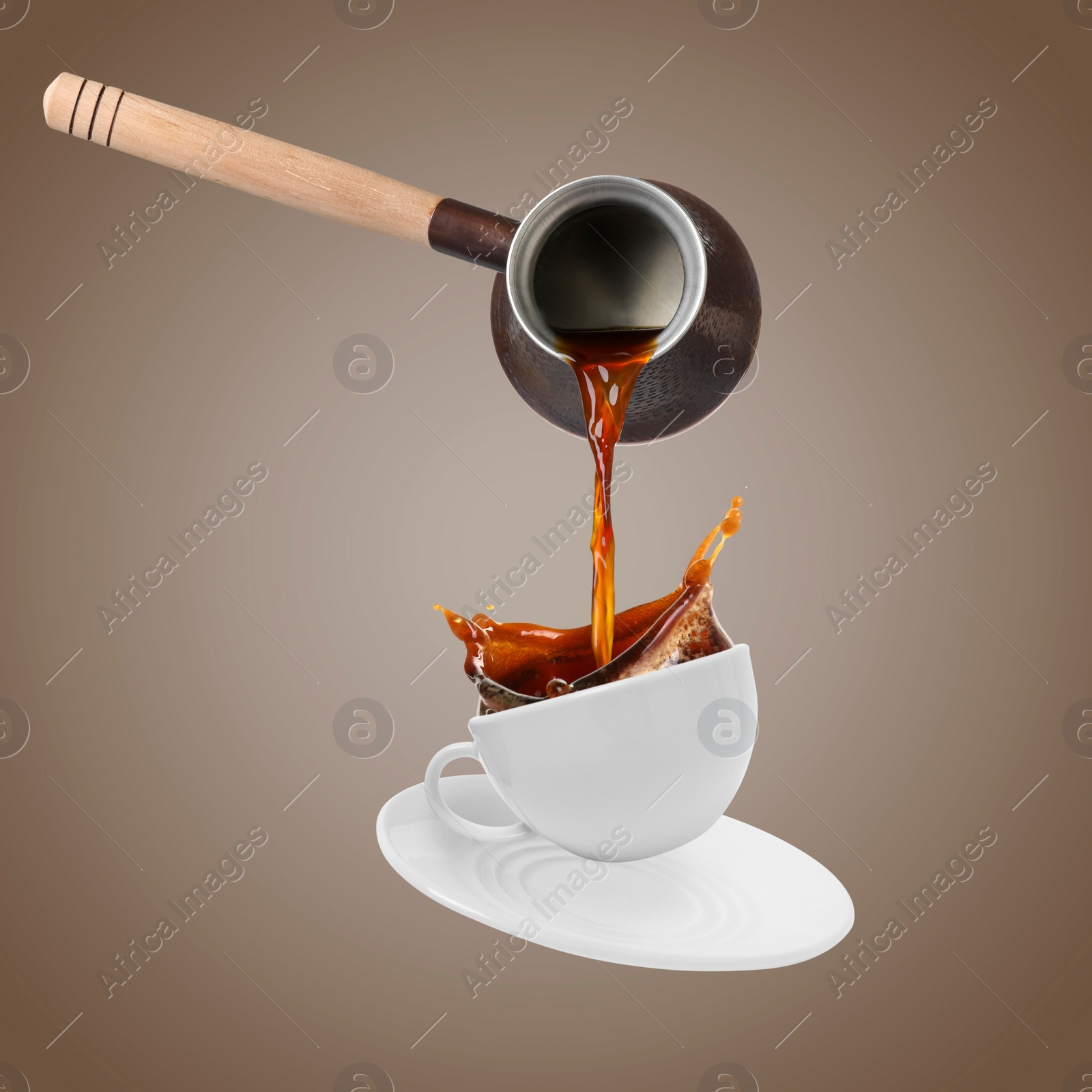 Image of Pouring freshly brewed aromatic coffee from turkish pot into cup. Objects in air on dark beige background