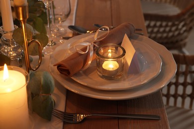 Photo of Festive table setting with beautiful tableware and decor