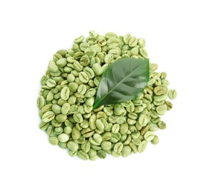 Photo of Green coffee beans and fresh leaf on white background, top view