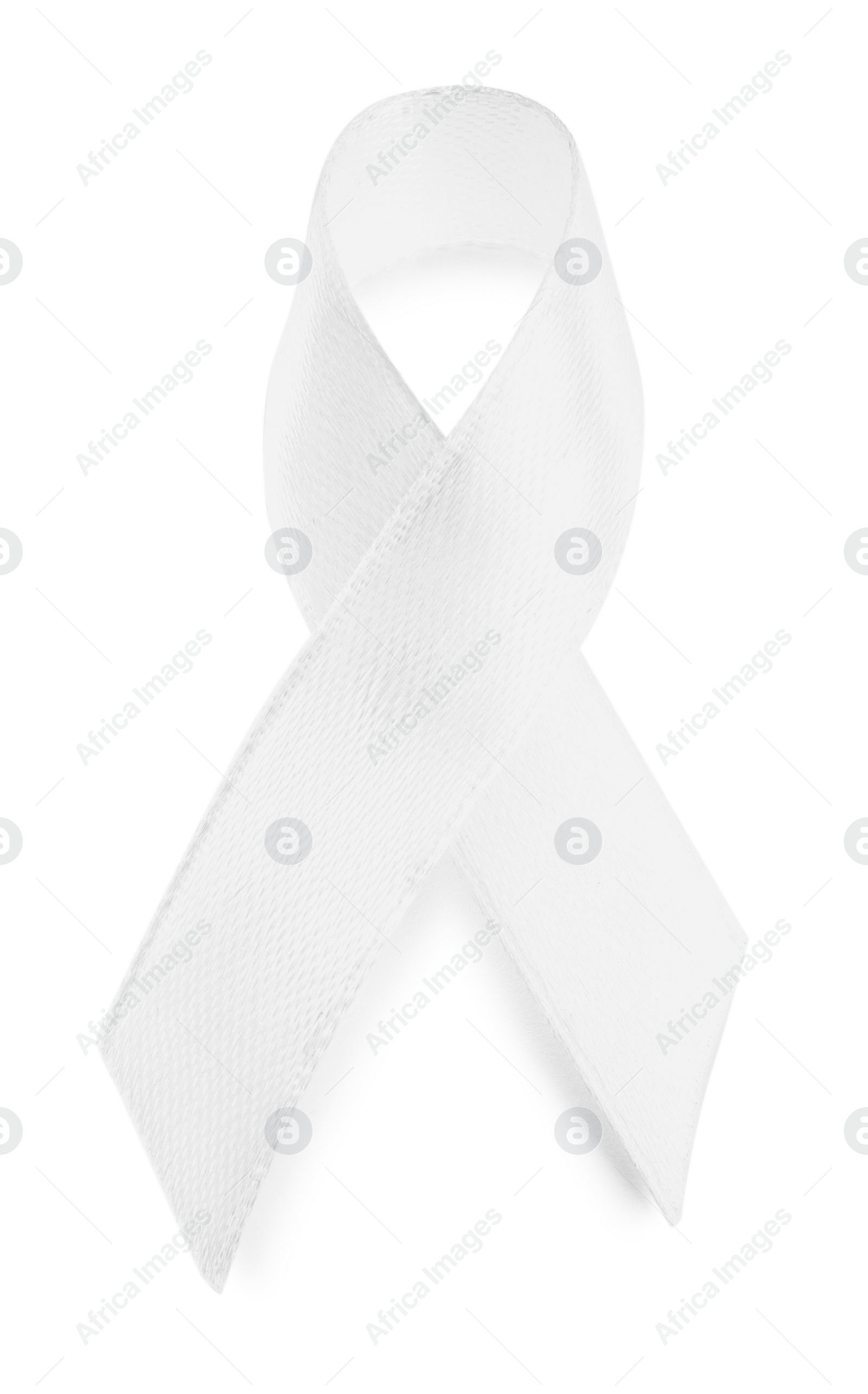 Photo of Bright ribbon isolated on white, top view. World Cancer Day