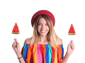 Photo of Young pretty woman with candies on white background