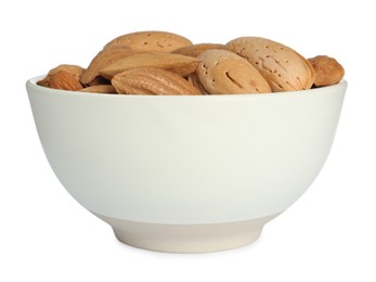 Photo of Ceramic bowl with almonds isolated on white. Cooking utensil