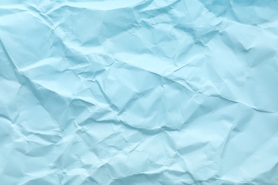 Sheet of color crumpled paper as background. Space for design