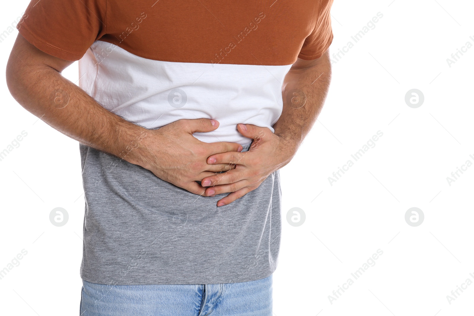 Photo of Man suffering from stomach ache on white background, closeup. Food poisoning