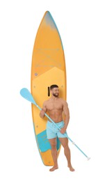 Happy man with orange SUP board and paddle on white background