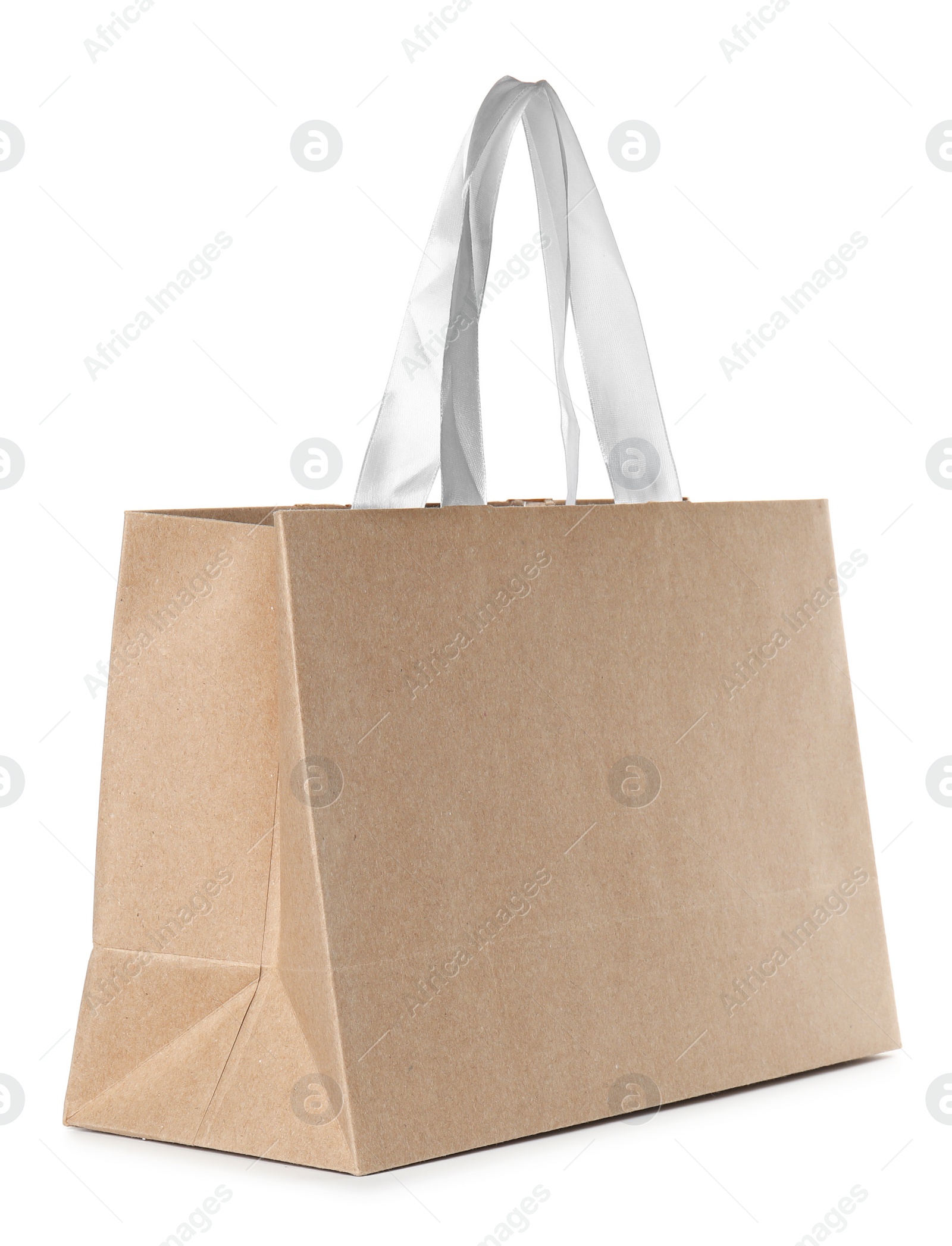 Photo of Paper shopping bag isolated on white. Mock up for design