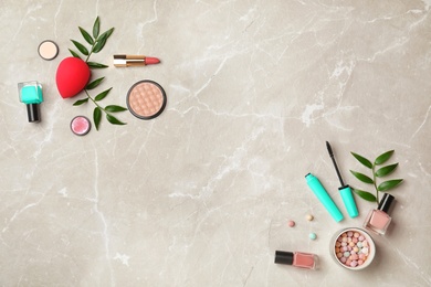 Flat lay composition with cosmetic products on grey background