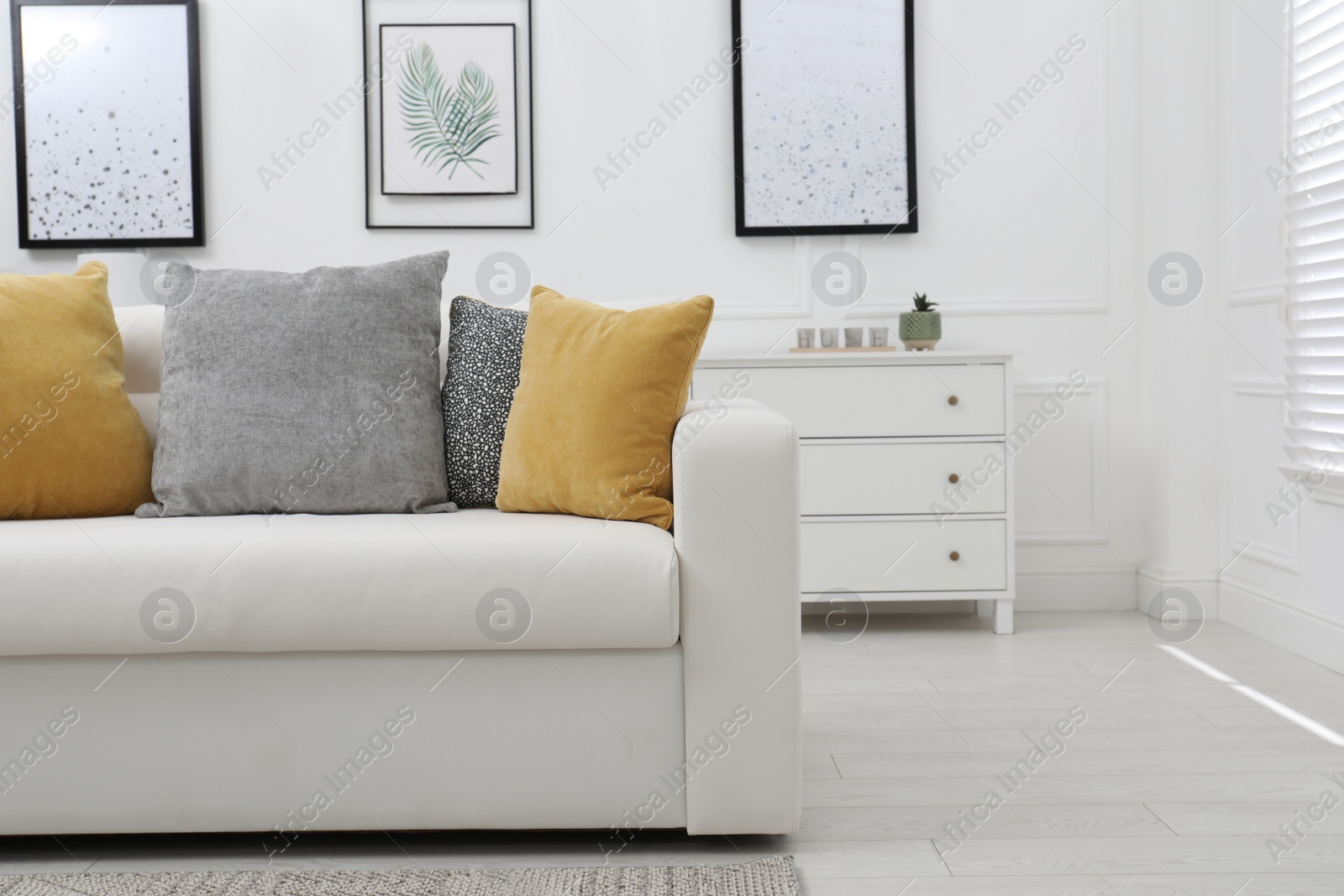 Photo of Stylish living room interior with comfortable sofa