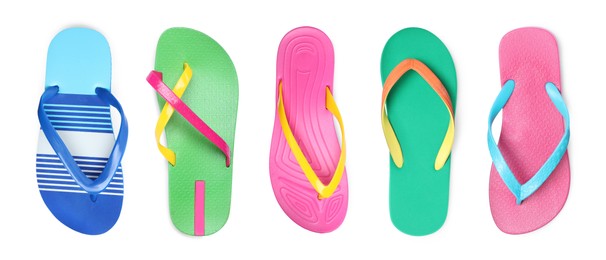 Set with different flip flops on white background, top view. Banner design