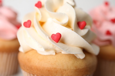 Photo of Tasty sweet cupcake, closeup. Happy Valentine's Day
