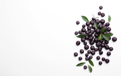 Fresh acai berries on white background, top view