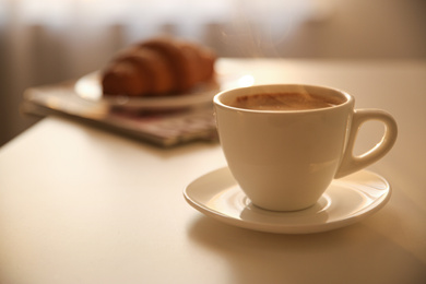 Photo of Cup of hot drink on table, space for text. Lazy morning