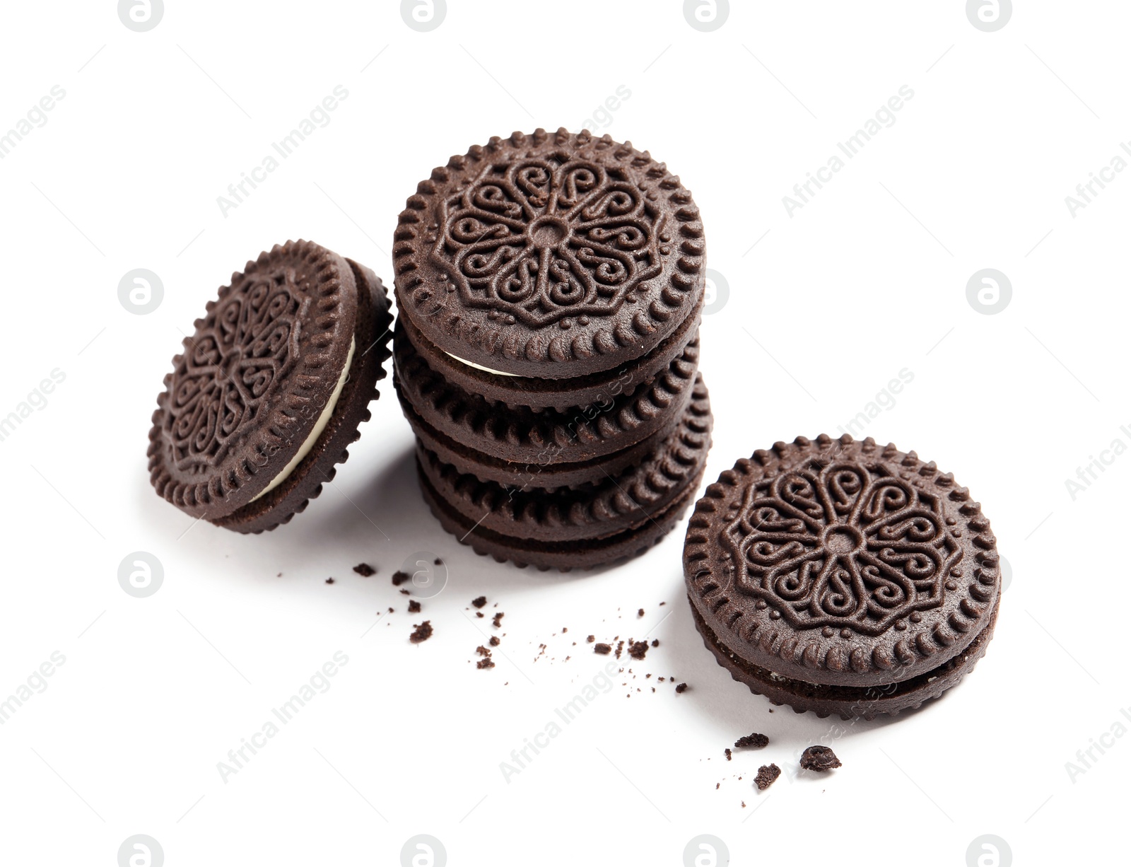 Photo of Tasty chocolate cookies and crumbs on white background