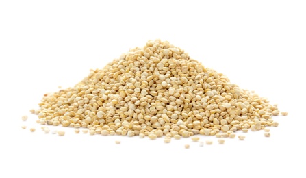 Photo of Pile of raw quinoa on white background