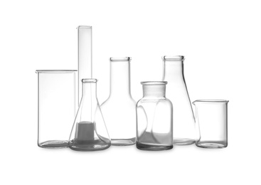 Photo of Clean empty laboratory glassware isolated on white