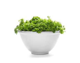 Bowl with fresh green parsley on white background