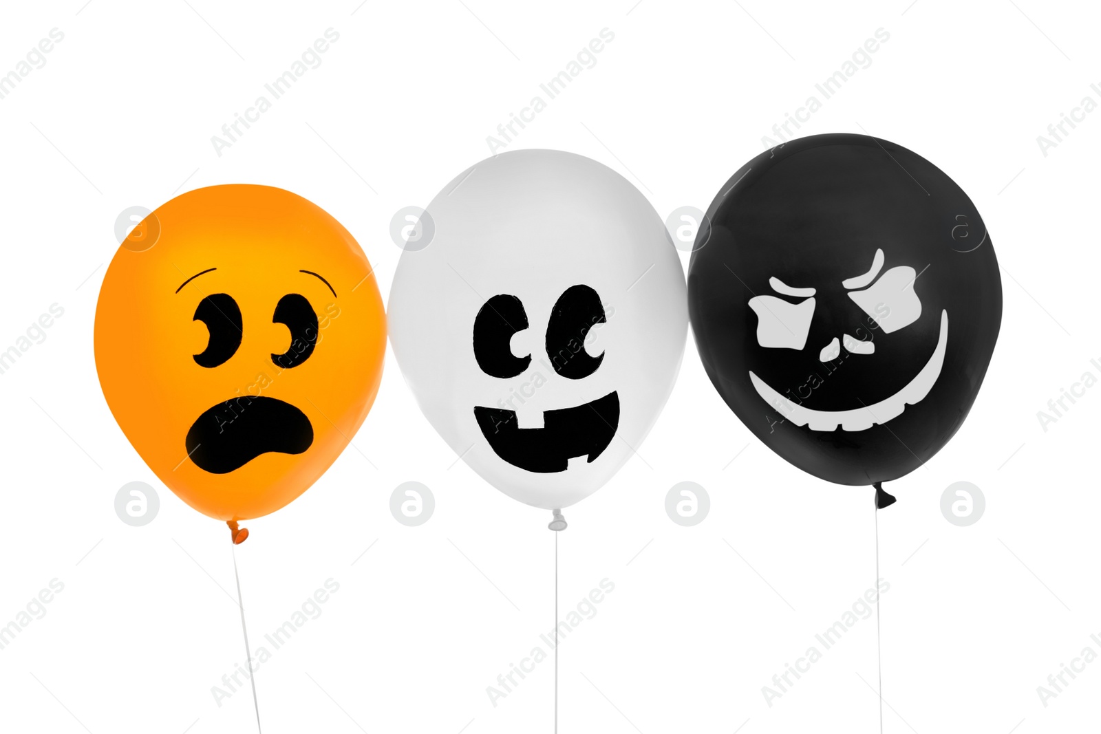 Photo of Spooky balloons for Halloween party on white background