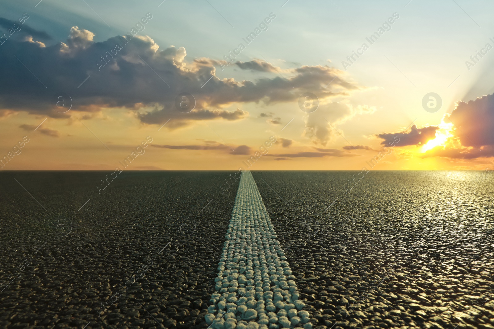 Image of View of empty asphalt road at sunset