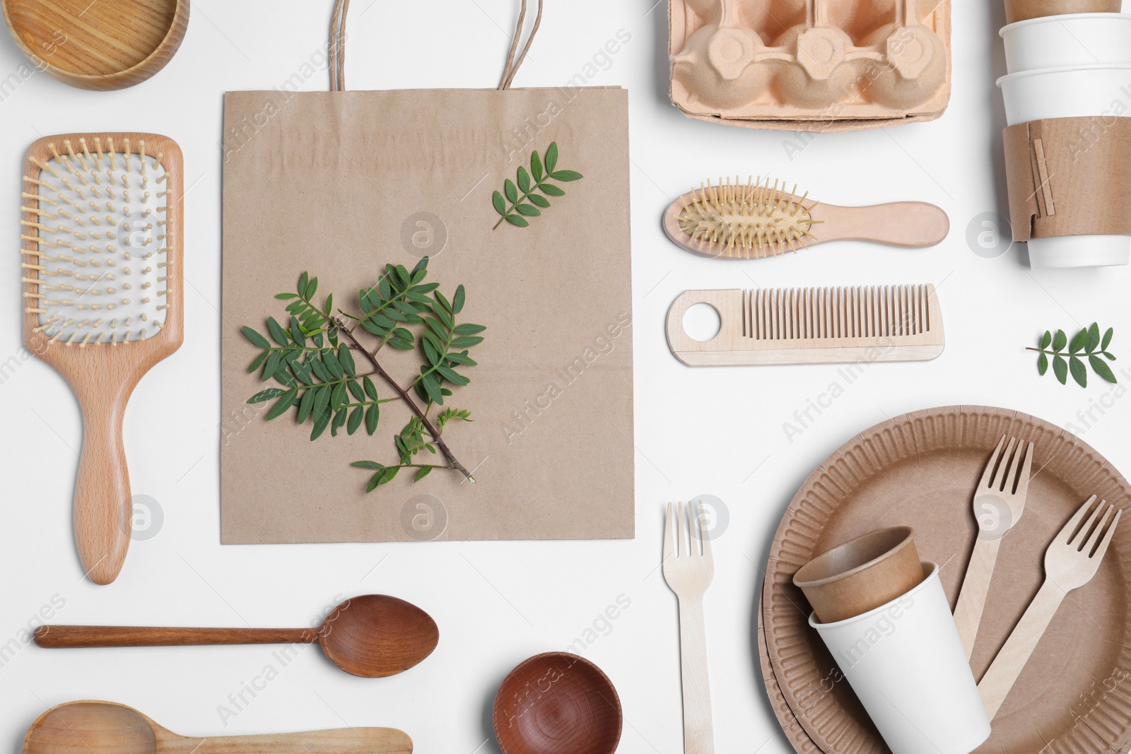 Photo of Different eco items on white background, flat lay. Recycling concept