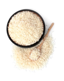 Photo of Plate, spoon and uncooked long grain rice on white background, top view