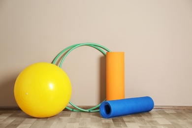 Hula hoops and other sports equipment in gym