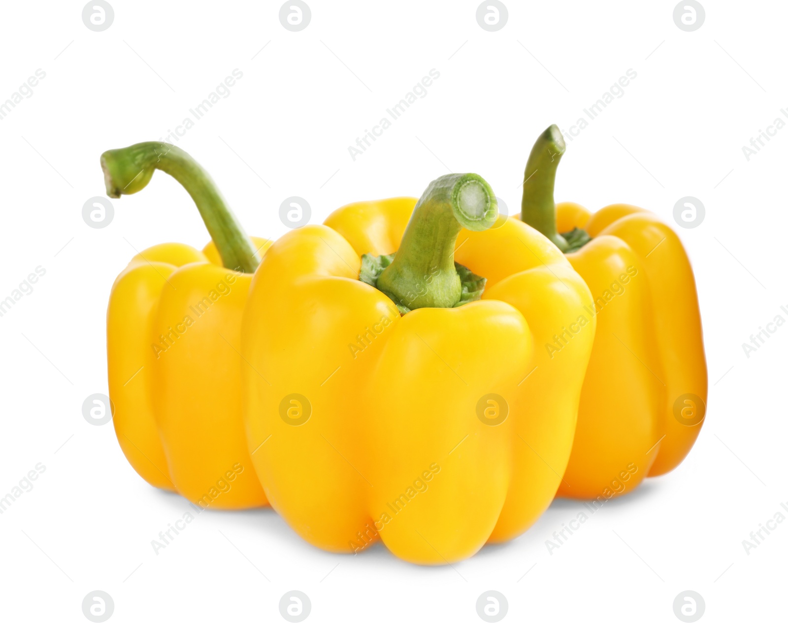 Photo of Ripe yellow bell peppers isolated on white