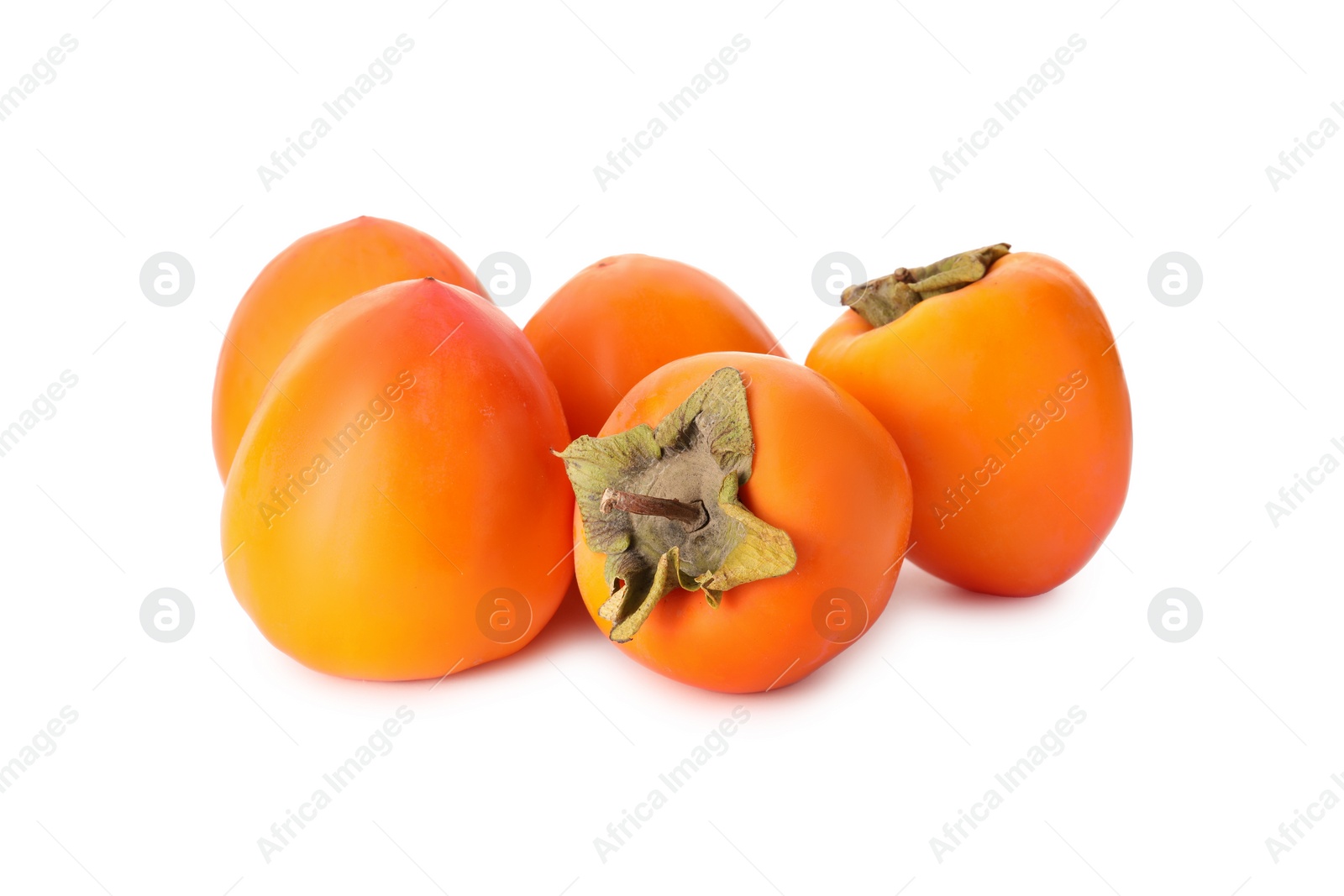 Photo of Delicious ripe juicy persimmons on white background