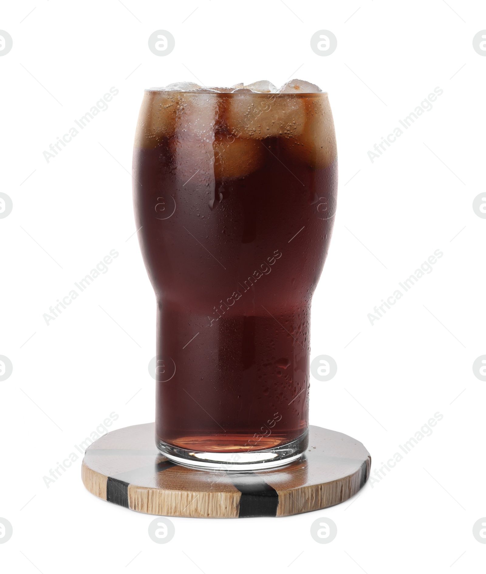 Photo of Glass of cold drink with ice cubes and stylish wooden cup coaster isolated on white