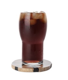 Glass of cold drink with ice cubes and stylish wooden cup coaster isolated on white