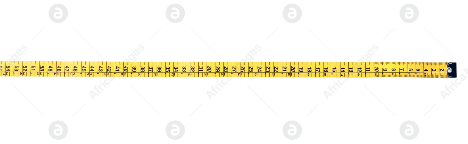 Photo of Long yellow measuring tape isolated on white, top view