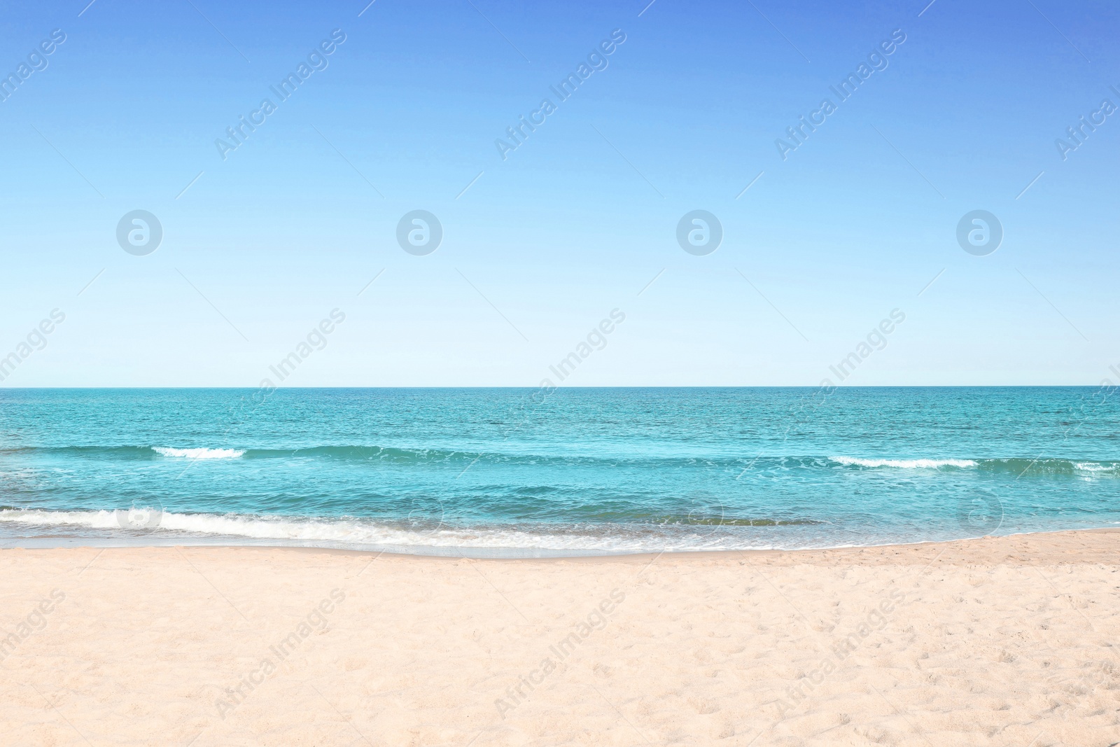 Photo of Picturesque view of sandy beach near sea