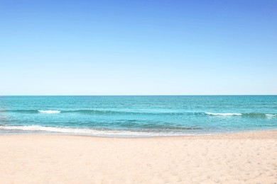 Photo of Picturesque view of sandy beach near sea