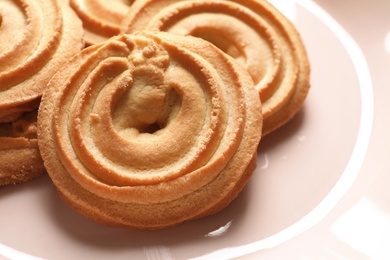 Photo of Plate with Danish butter cookies, closeup view