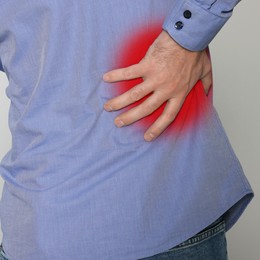 Image of Man suffering from rheumatism on light background, closeup